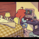 Madeline sits at her computer talking to her friend Theo. Miniature Queer and Trans Pride flags are visible near the keyboard.